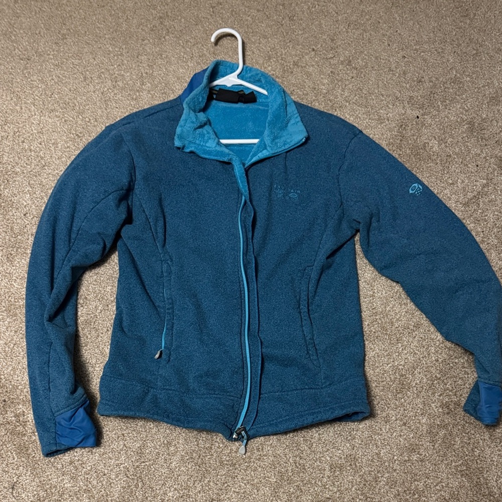 Mountain Hardwear Teal zip up jacket.